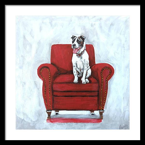 Dog on red chair - Framed Print
