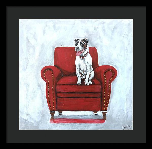 Dog on red chair - Framed Print