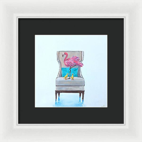 Flamingo n baby ducks on chair - Framed Print