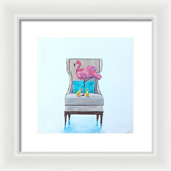 Flamingo n baby ducks on chair - Framed Print