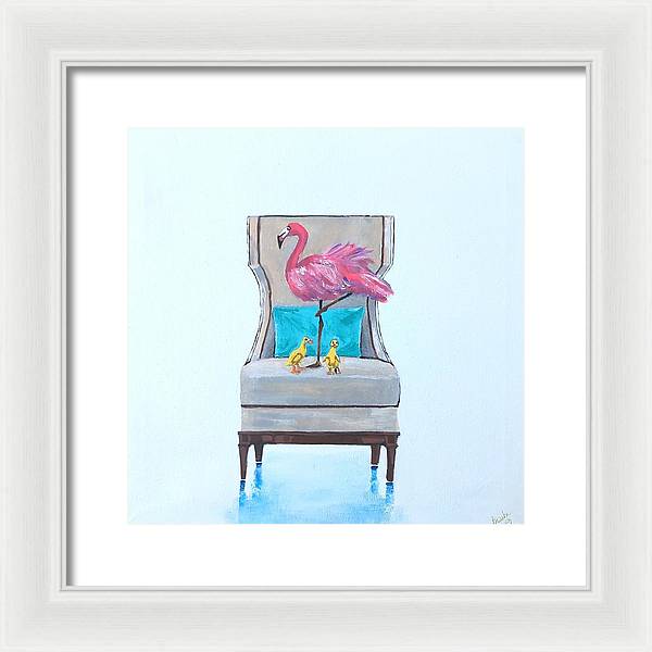 Flamingo n baby ducks on chair - Framed Print