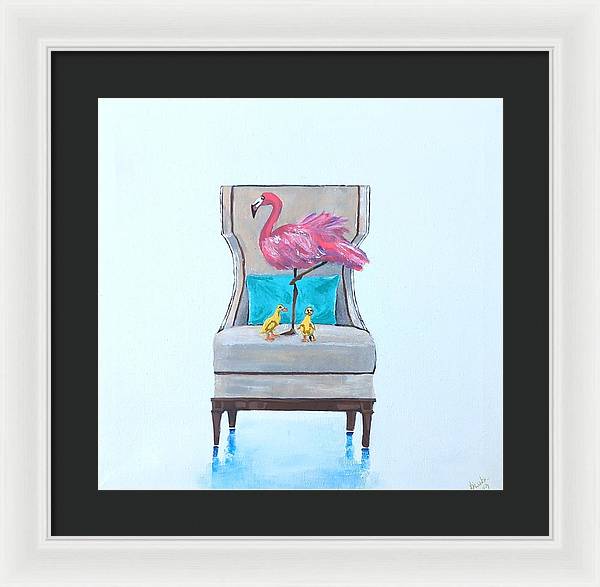 Flamingo n baby ducks on chair - Framed Print